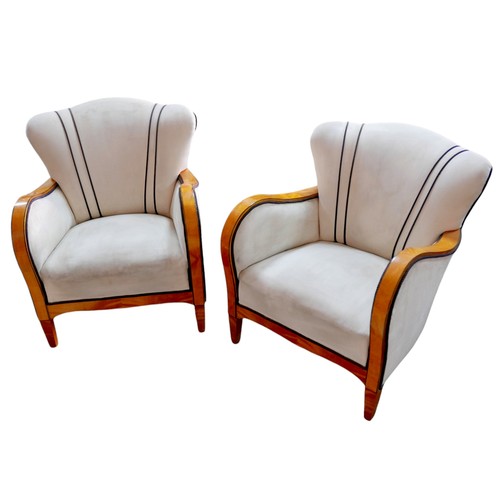 369 - A pair of 1930s Swedish Art Deco birchwood framed armchairs, with cream faux suede upholstery, each ... 