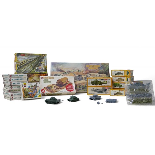 240 - A collection of Airfix military models, including a 'Gun Emplacement Assault' set, tanks, soldiers, ... 