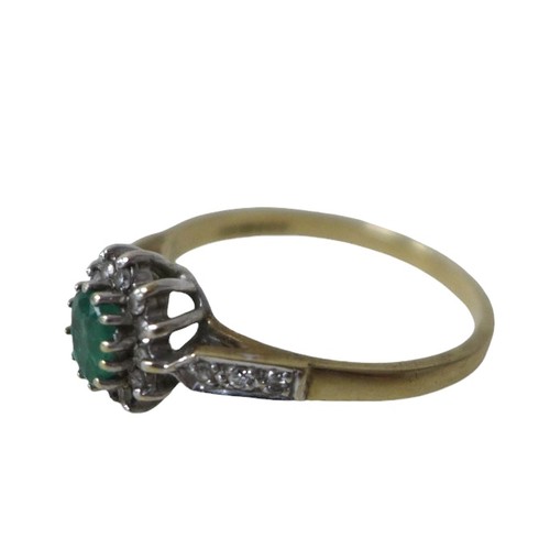 57 - A 9ct gold, emerald and diamond flowerhead ring, set with an oval-cut emerald and ring of small diam... 