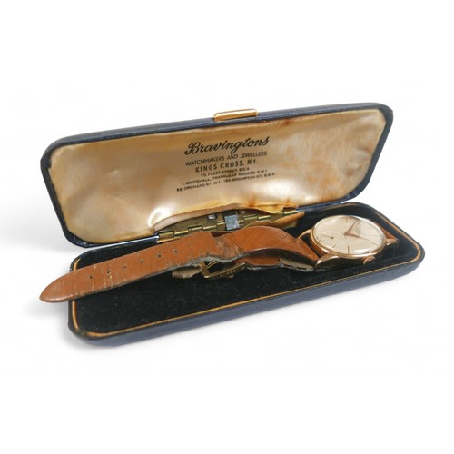 120 - A vintage Bravingtons Renown wristwatch with 9ct gold case, with golden Arabic and baton hour marker... 