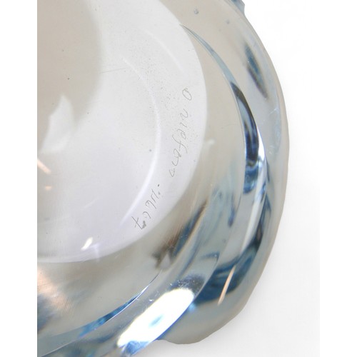 134 - A Swedish art glass low bowl by Edvin Ohrstrom, the tinted blue glass moulded in a swirl design, sig... 