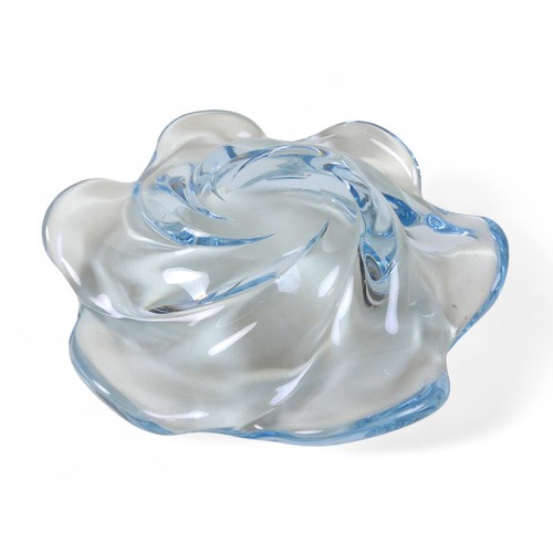 134 - A Swedish art glass low bowl by Edvin Ohrstrom, the tinted blue glass moulded in a swirl design, sig... 