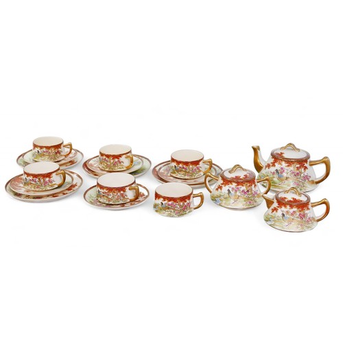 154 - A Satsuma ware part tea-set, comprising cups, saucers plates, pots, with two character mark to bases... 