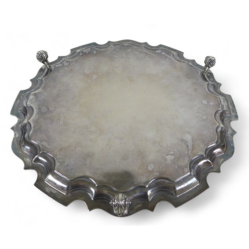 97 - An Elizabeth II silver salver with chippendale rim, Walker and Hall Sheffield 1951/52, 31.5 by 31.5 ... 