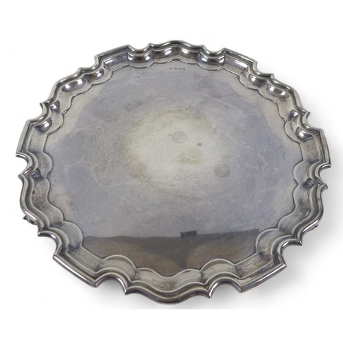 97 - An Elizabeth II silver salver with chippendale rim, Walker and Hall Sheffield 1951/52, 31.5 by 31.5 ... 