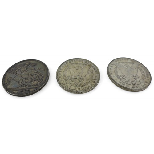 125 - Two silver dollar coins 1890 and 1900, an Edward VII crown 1902 and a 1951 crown. (4)