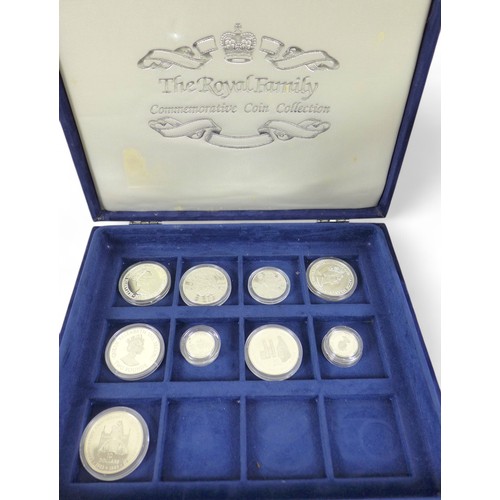 129 - A collection of coins to include nine silver proof coins, (1 box)