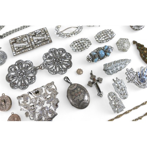 28 - A selection of silver and costume jewellery, including lockets and chains. (1 bag)