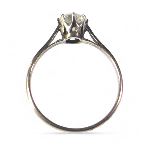 58 - A Platinum and 18ct white gold diamond solitaire ring, the round cut diamond approximately 6 by 6 by... 