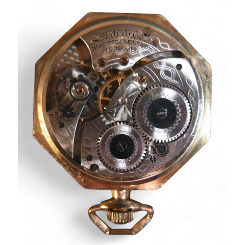 101 - A Waltham gold plated octagonal pocket watch, top wind 15 jewel movement, 42mm case, running.