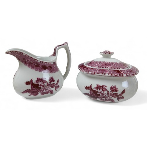 151 - A Spode pink camilla coffee set, with tea and coffee pots, milk and sugar and eight coffee cans and ... 