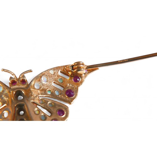 22 - A 9ct gold opal and ruby stone butterfly brooch, 4.1 by 2.3cm, 4.9g.