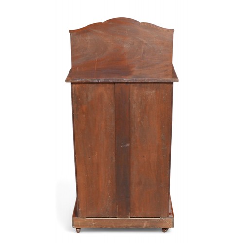 313 - An early 20th century mahogany music cabinet, with single glazed door, 56 by 34.5 by 120.5cm high.