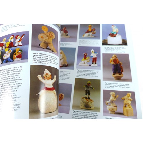 148 - Three bisque porcelain upright position figures with reference books, comprising two Heubach figures... 