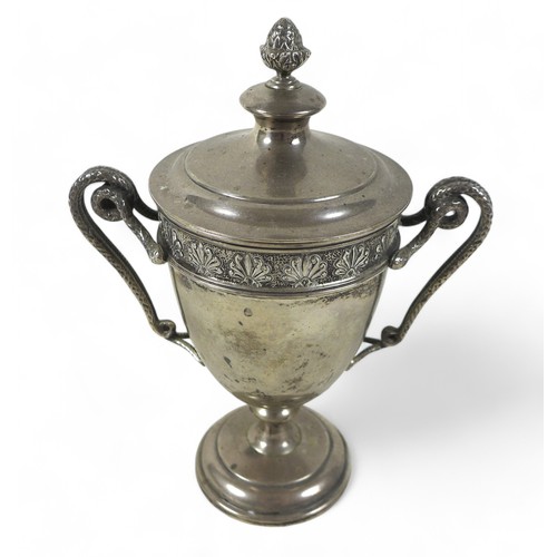 94 - A George V silver lidded twin handle cup, Mappin and Webb Sheffield 1931/32, the lid having a pineap... 