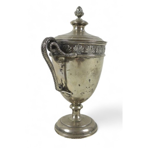 94 - A George V silver lidded twin handle cup, Mappin and Webb Sheffield 1931/32, the lid having a pineap... 