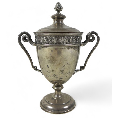 94 - A George V silver lidded twin handle cup, Mappin and Webb Sheffield 1931/32, the lid having a pineap... 