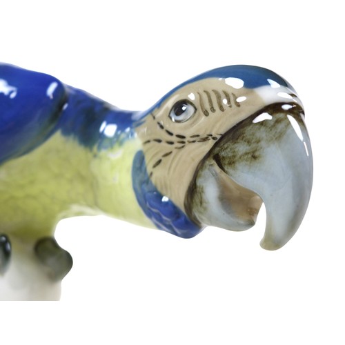 144 - A Royal Dux Bohemia porcelain parrot, with applied factory mark, printed and impressed marks to its ... 