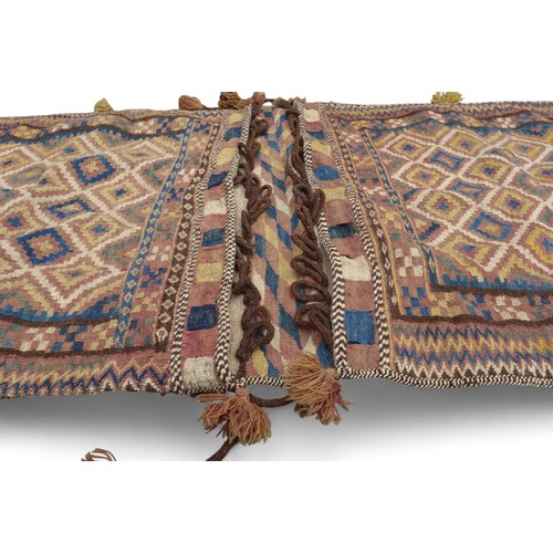 334 - A Kelim double pocket camel rug, 180 by 80cm.