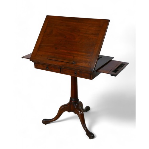 344 - A George III mahogany architects/drawing table, with a rising reading flap having a sprung rest, abo... 