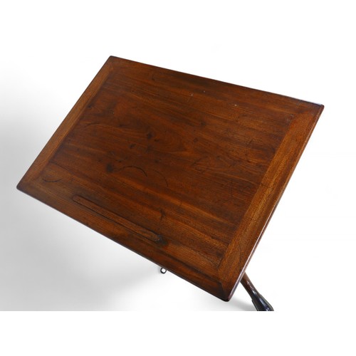 344 - A George III mahogany architects/drawing table, with a rising reading flap having a sprung rest, abo... 