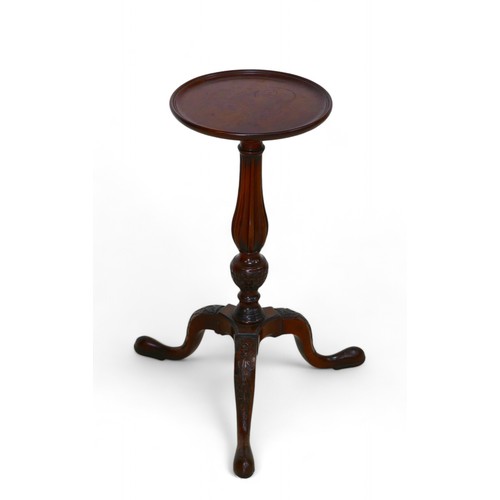 325 - A George III style mahogany wine table, on a carved tripod  base, 25cm diameter top 55cm high.