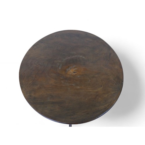 331 - A George III mahogany tilt top wine table, on a turned column and tripod base, 60cm diameter 70cm hi... 