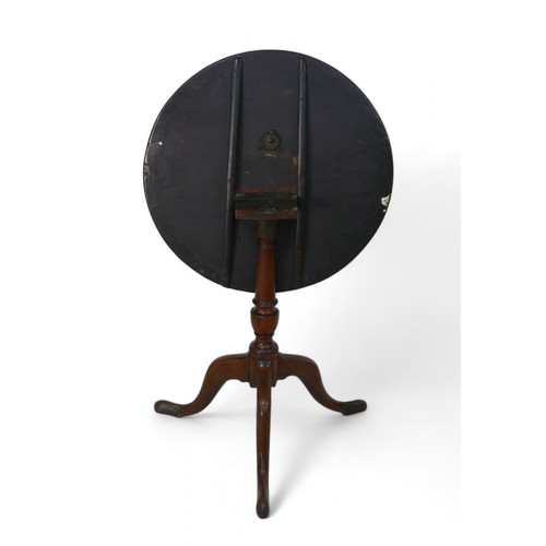 331 - A George III mahogany tilt top wine table, on a turned column and tripod base, 60cm diameter 70cm hi... 