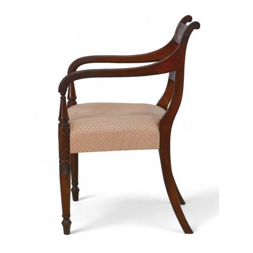 324 - A George III mahogany carver chair, with over stuffed seat, 48 by 53 by 85cm high.