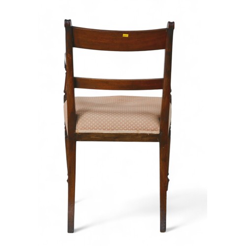 324 - A George III mahogany carver chair, with over stuffed seat, 48 by 53 by 85cm high.