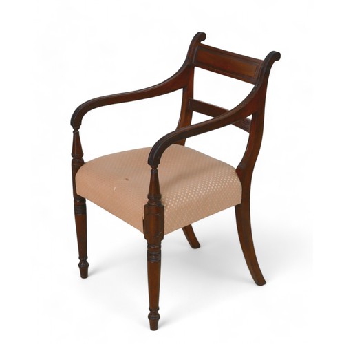 324 - A George III mahogany carver chair, with over stuffed seat, 48 by 53 by 85cm high.