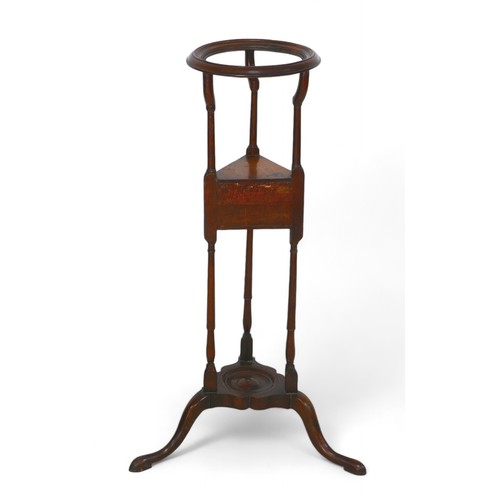 323 - A George III mahogany wig stand, with a powder drawer on platform tripod base, 25cm diameter top 84c... 