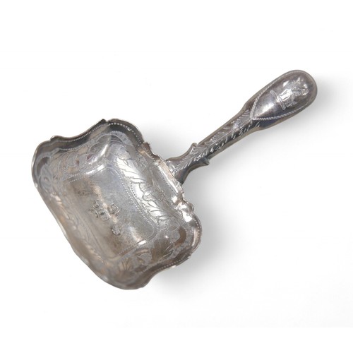 88 - Four pieces of George III and later silver, including a George III caddy spoon, John Bettridge, Birm... 