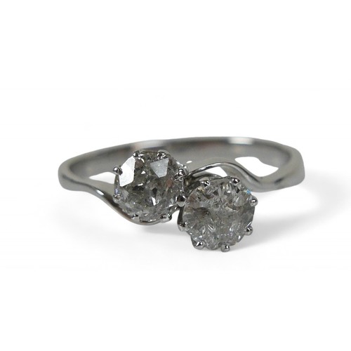 60 - A white metal two stone diamond crossover ring, the diamond measure approximately 5 by 2.8mm 0.40ct ... 