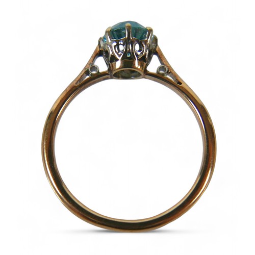 20 - A 9ct yellow gold single blue stone ring, ring size P, 2.3g.