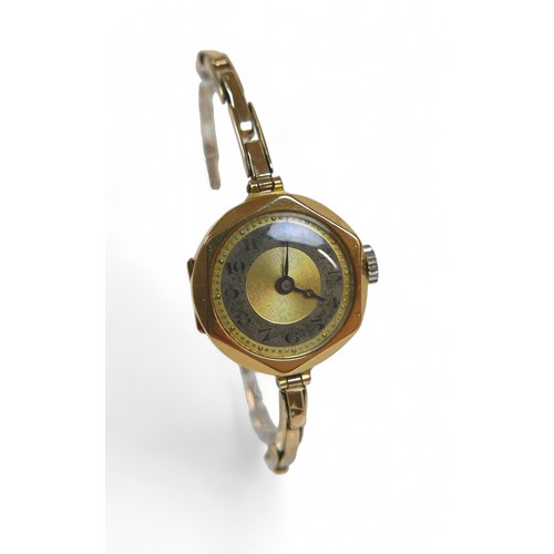 118 - A 9ct yellow gold ladies bracelet wristwatch, manual wind 23mm case on a stung strap, 18.0g, current... 