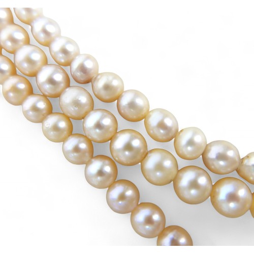 32 - Three pearl necklaces, including a two strand necklace with irregular pearls, 68cm long, 110.9g gros... 