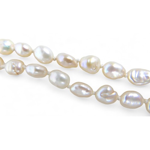 32 - Three pearl necklaces, including a two strand necklace with irregular pearls, 68cm long, 110.9g gros... 