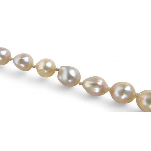 32 - Three pearl necklaces, including a two strand necklace with irregular pearls, 68cm long, 110.9g gros... 