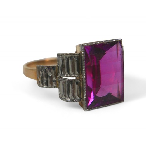 49 - An 18ct gold pink sapphire ring, the convex rectangular cut sapphire, 8 by 11mm, size O, 3.6g, an 18... 