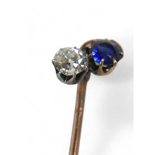 7 - Two sapphire and diamond stick pins, with yellow metal mounts, one stick pin with single diamond and... 