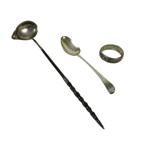 83 - Three silver items, comprising table spoon, bangle and a ladle, weighable silver 82.5g/2.6 troy oz.(... 