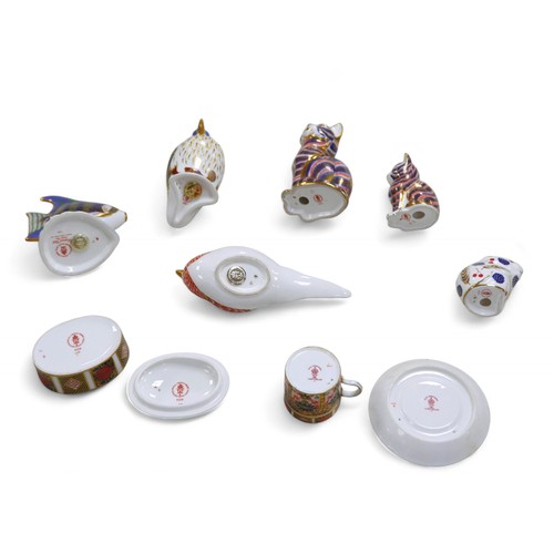 147 - Eight pieces Royal Crown Derby, including Tropical fish, 11.7cm high, Puffin, 12cm high, pheasant pa... 