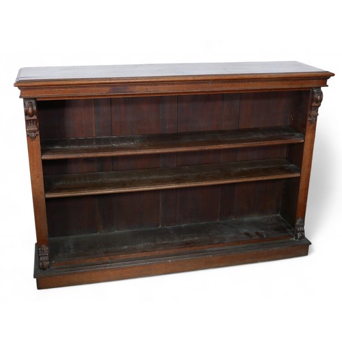 327 - A 19th century oak bookcase, with two adjustable shelves, 147.5 by 36 by 103cm high.