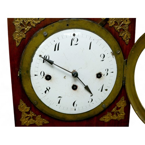 210 - A 19th century continental mantel clock, its Roman numeral dial, with marble effect column supports,... 