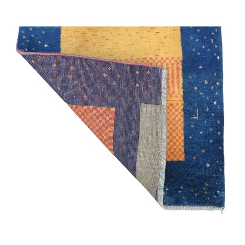 348 - A Gabbeh runner rug, blue border and a yellow and orange central rectangle, 255 by 83cm.