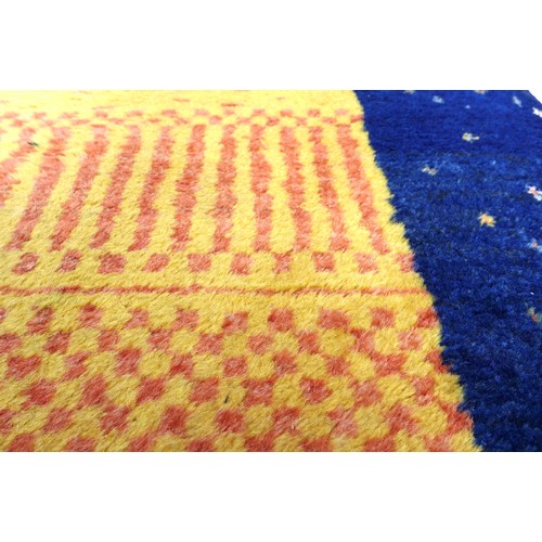 348 - A Gabbeh runner rug, blue border and a yellow and orange central rectangle, 255 by 83cm.