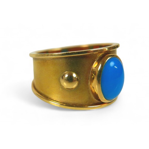 63 - An 18ct gold and turquoise ring, the single oval cut turquoise stone, 9 by 7mm, size Q/R, 11.1g.