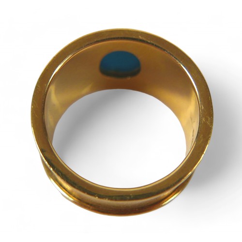 63 - An 18ct gold and turquoise ring, the single oval cut turquoise stone, 9 by 7mm, size Q/R, 11.1g.