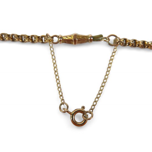 47 - A 9ct gold chain necklace with yellow metal red stone locket, with a cutting of hair verso, necklace... 